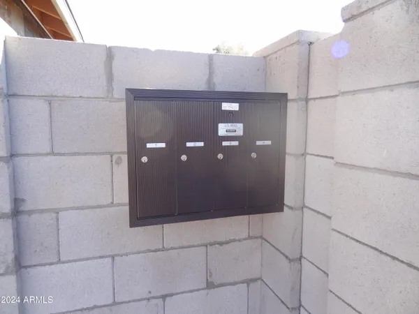 a view of a car parked on the side of a street