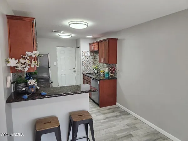 a view of kitchen with a potted plant
