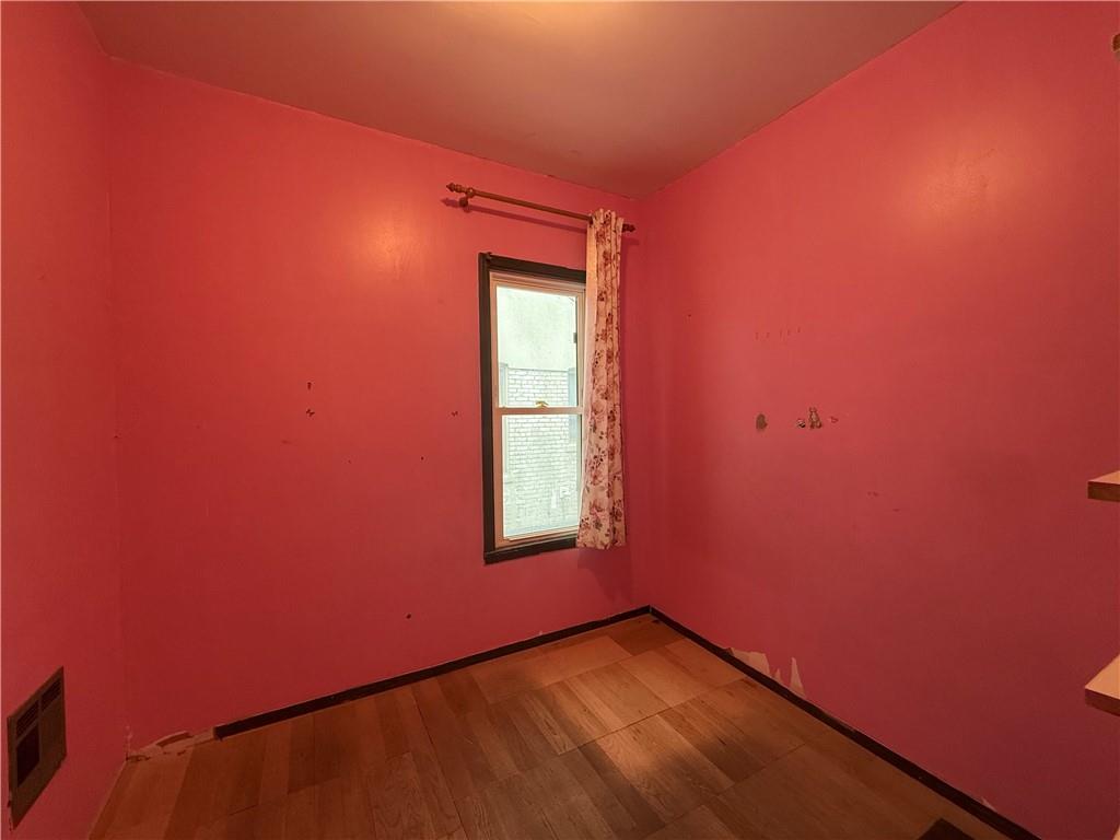 133 Quentin Road Brooklyn, NY 11223 - Photo 10 of 12 a view of a small space with a window
