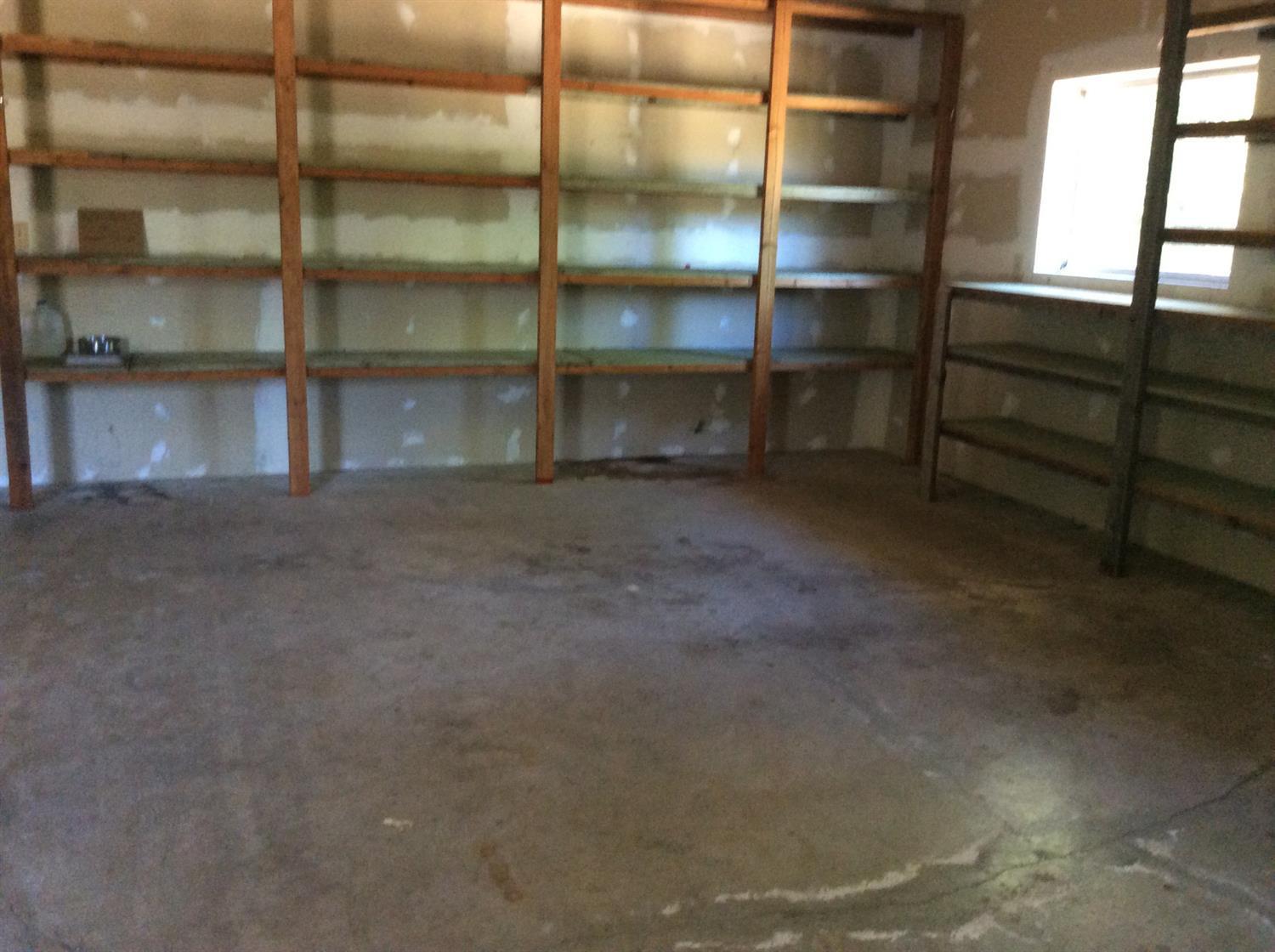 16444 Water Gap Road Williams, OR 97544 - Photo 31 of 34 shelving in garage