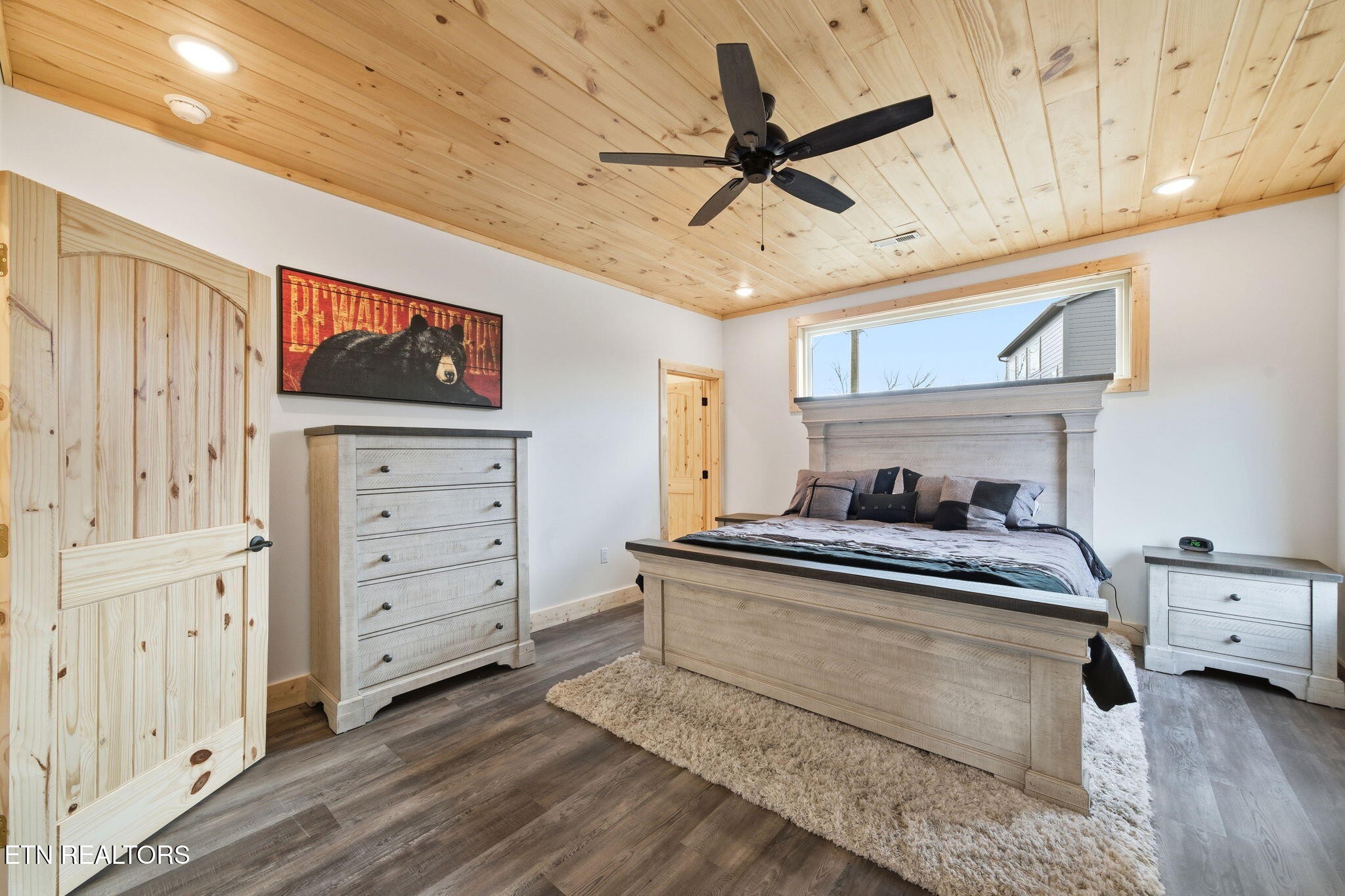 650 Ridge Top Loop Gatlinburg, TN 37738 - Photo 18 of 38 a bedroom with furniture and ceiling fan