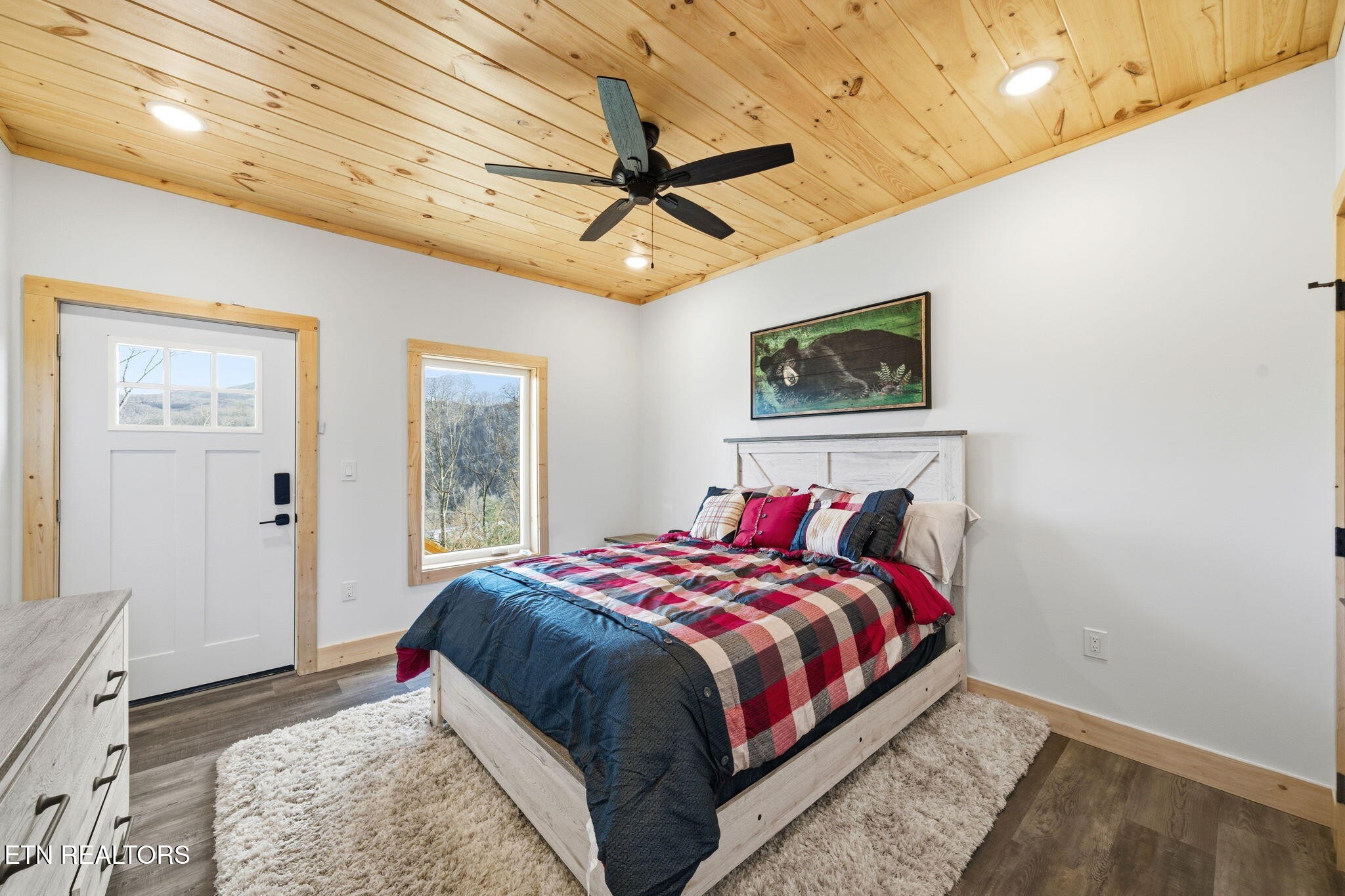 650 Ridge Top Loop Gatlinburg, TN 37738 - Photo 24 of 38 a bedroom with a bed and a window