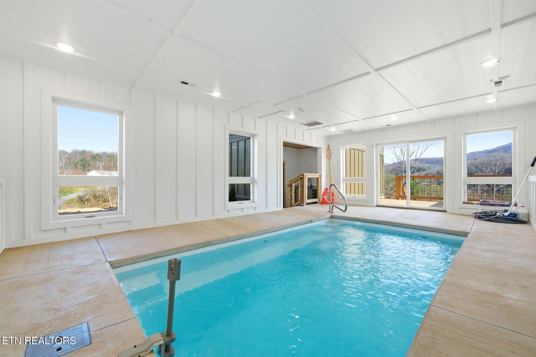 650 Ridge Top Loop Gatlinburg, TN 37738 - Photo 3 of 38 a living room with furniture and a open kitchen view