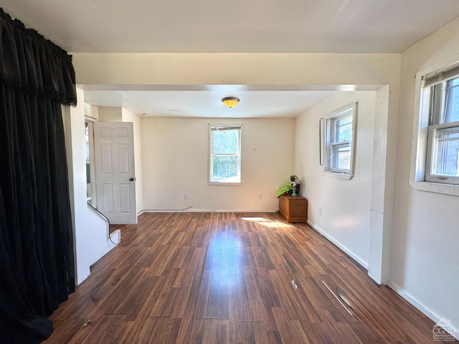 357 Highway 385 Athens, NY 12414 - Photo 14 of 22 wooden floor in an empty room with a window