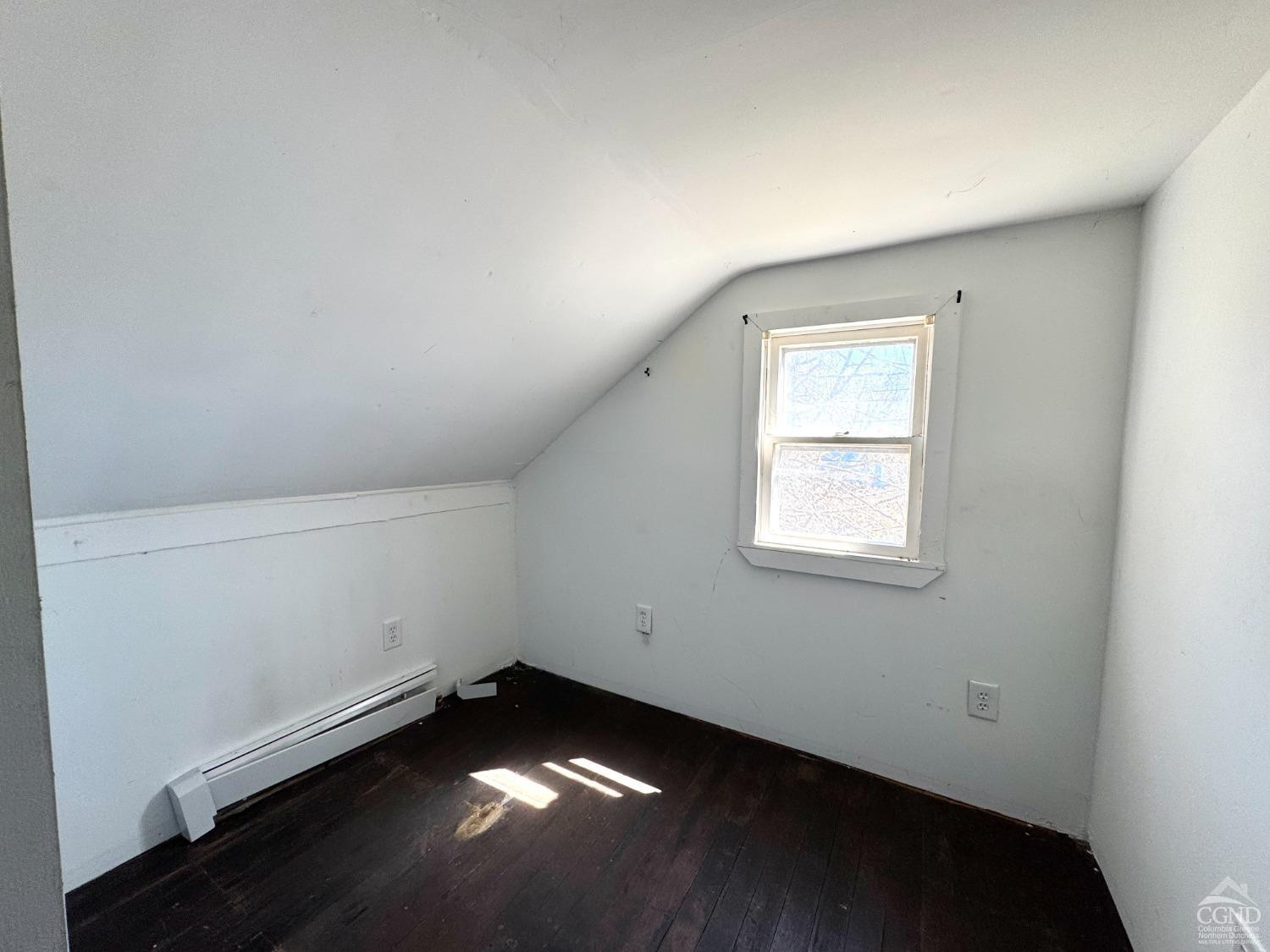 357 Highway 385 Athens, NY 12414 - Photo 18 of 22 an empty room with wooden floor and windows