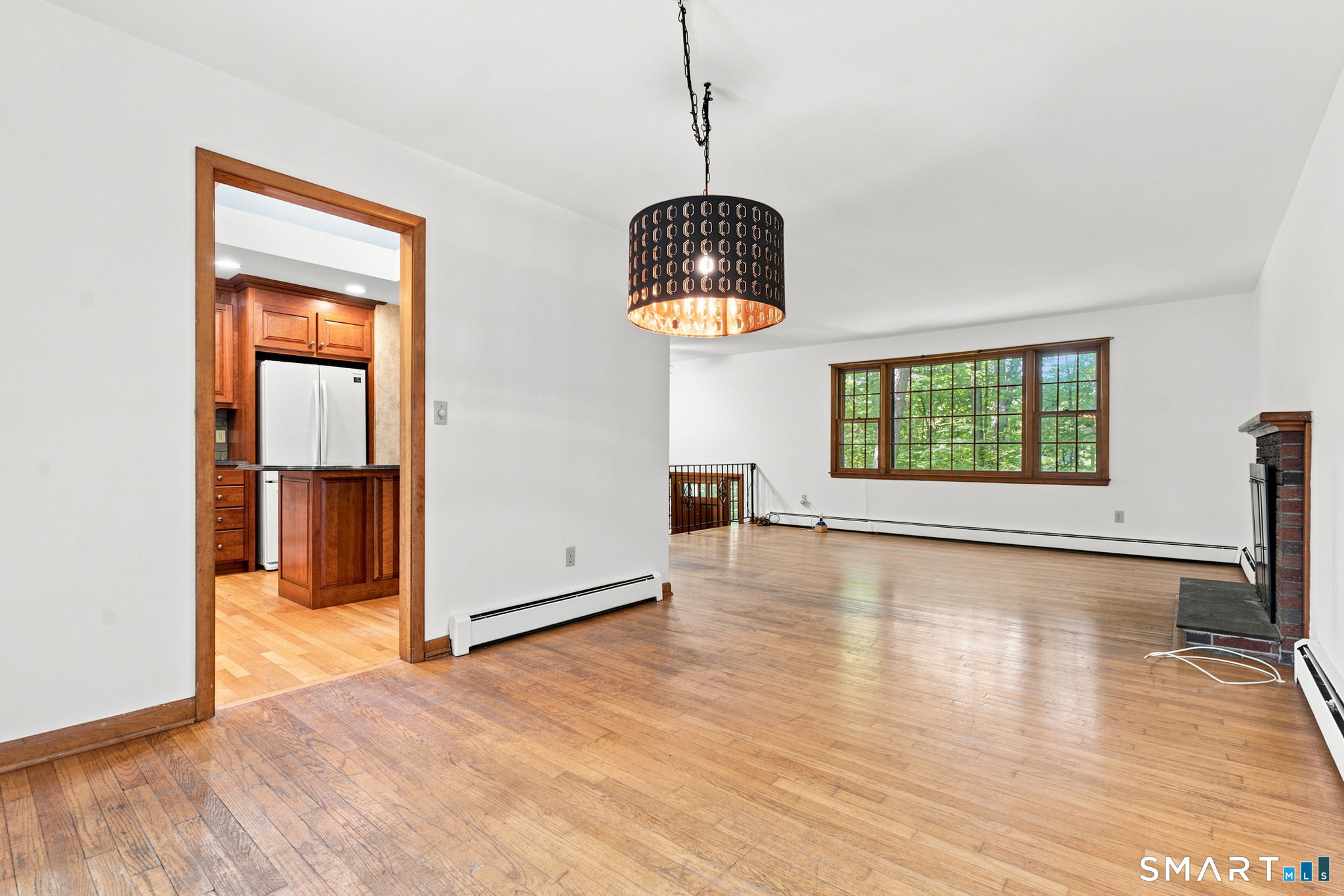 448 Mixville Road Cheshire, CT 06410 - Photo 9 of 32 wooden floor in an empty room with a window