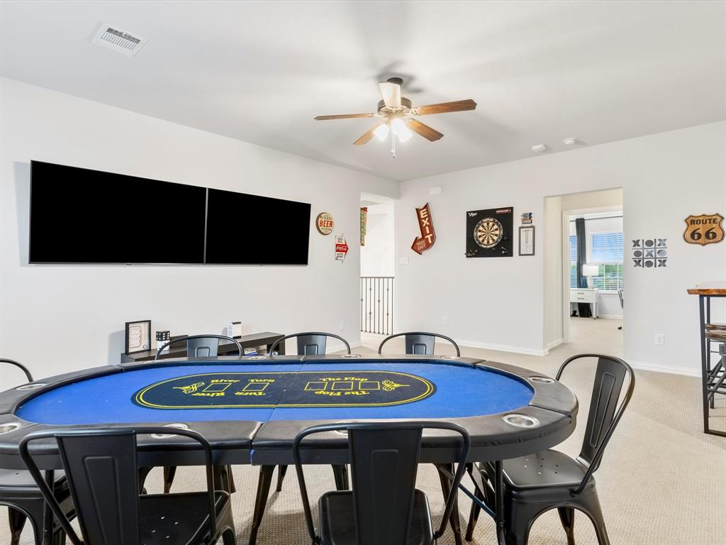2156 Cloverfern Way Haslet, TX 76052 - Photo 29 of 40 a view of a dining room with furniture and wooden floor