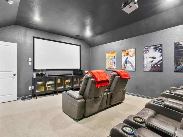 a bathroom with a granite countertop sink toilet a shower and a mirror