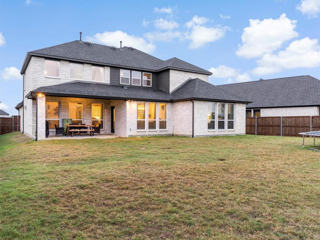 2156 Cloverfern Way Haslet, TX 76052 - Photo 36 of 40 a front view of a house with a garden