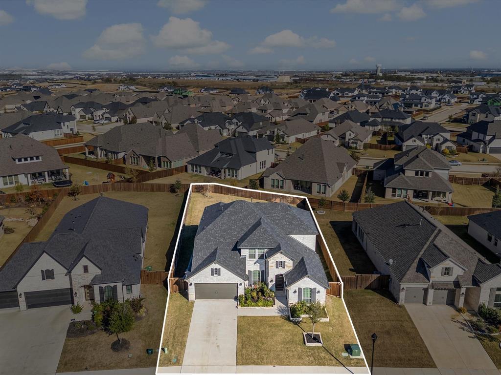 2156 Cloverfern Way Haslet, TX 76052 - Photo 39 of 40 an aerial view of a house with a swimming pool