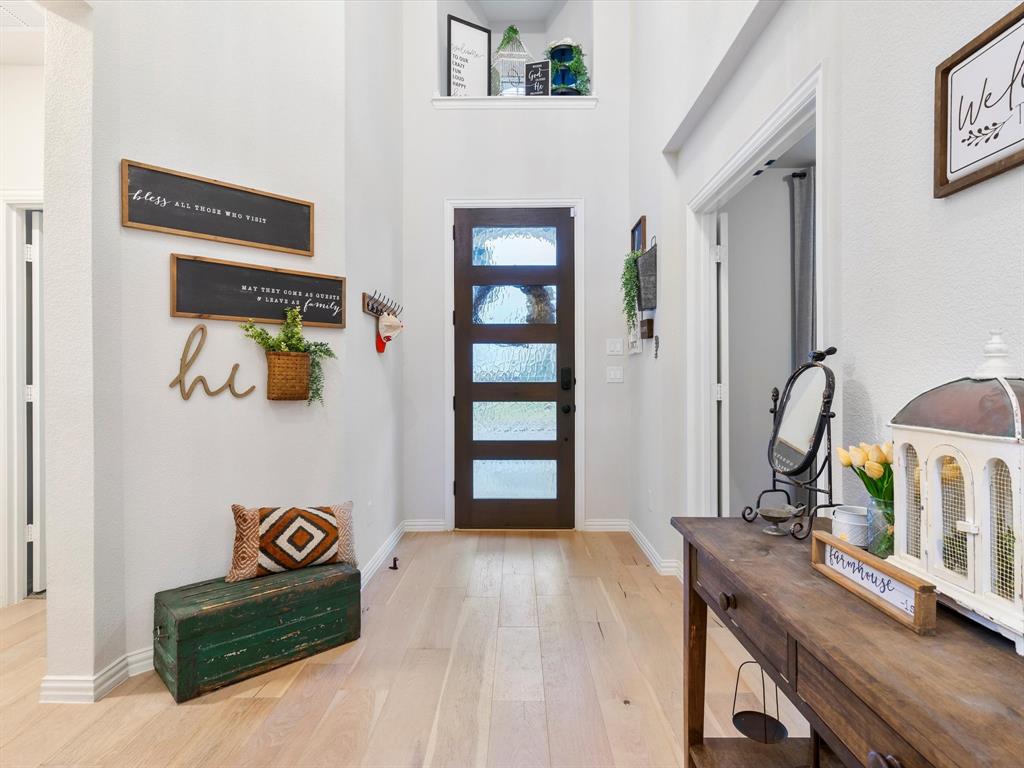 2156 Cloverfern Way Haslet, TX 76052 - Photo 6 of 40 a view of a hallway with workspace and a window
