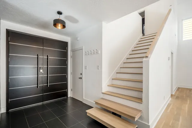 a view of an entryway with stairs