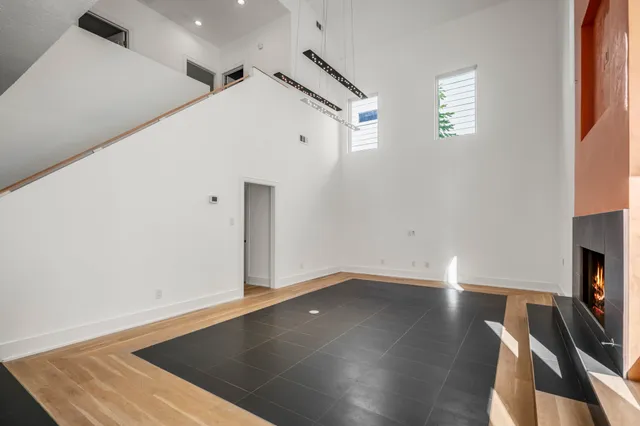 a view of a livingroom with wooden floor