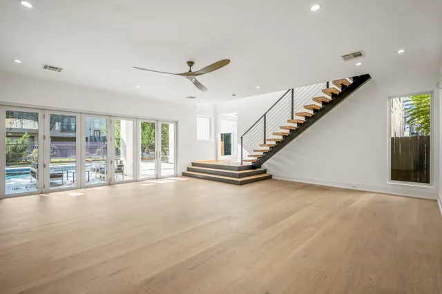 a kitchen with stainless steel appliances granite countertop a stove and a sink