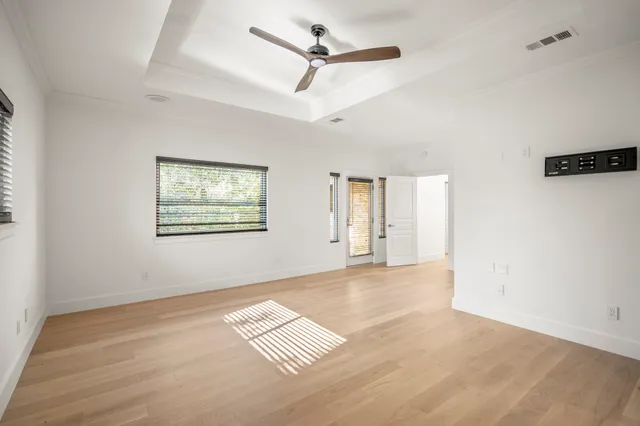 a view of a balcony with wooden fence