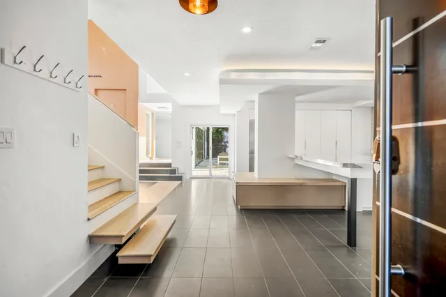 a spacious bathroom with a tub and shower