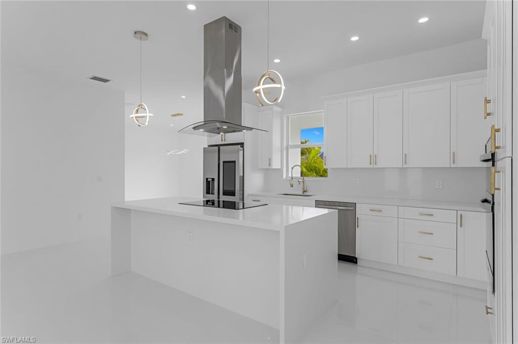 9107 Henry Road Fort Myers, FL 33967 - Photo 9 of 26 a kitchen with cabinets and window