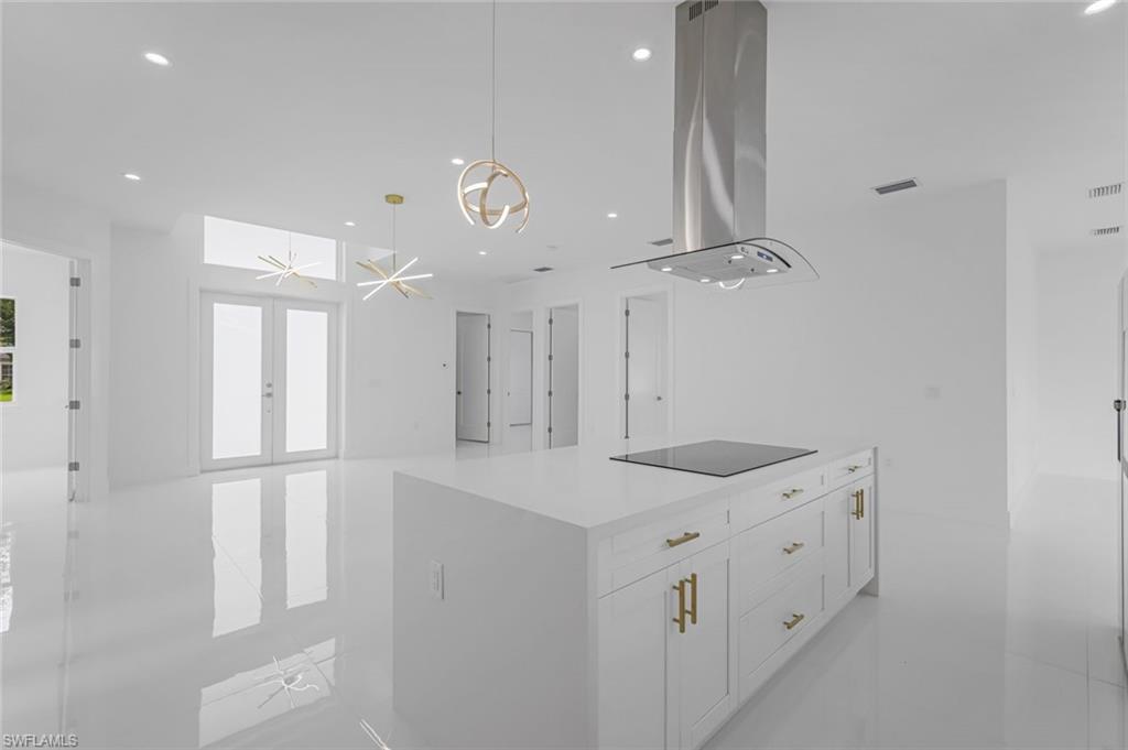 9107 Henry Road Fort Myers, FL 33967 - Photo 10 of 26 a kitchen with a sink and cabinets
