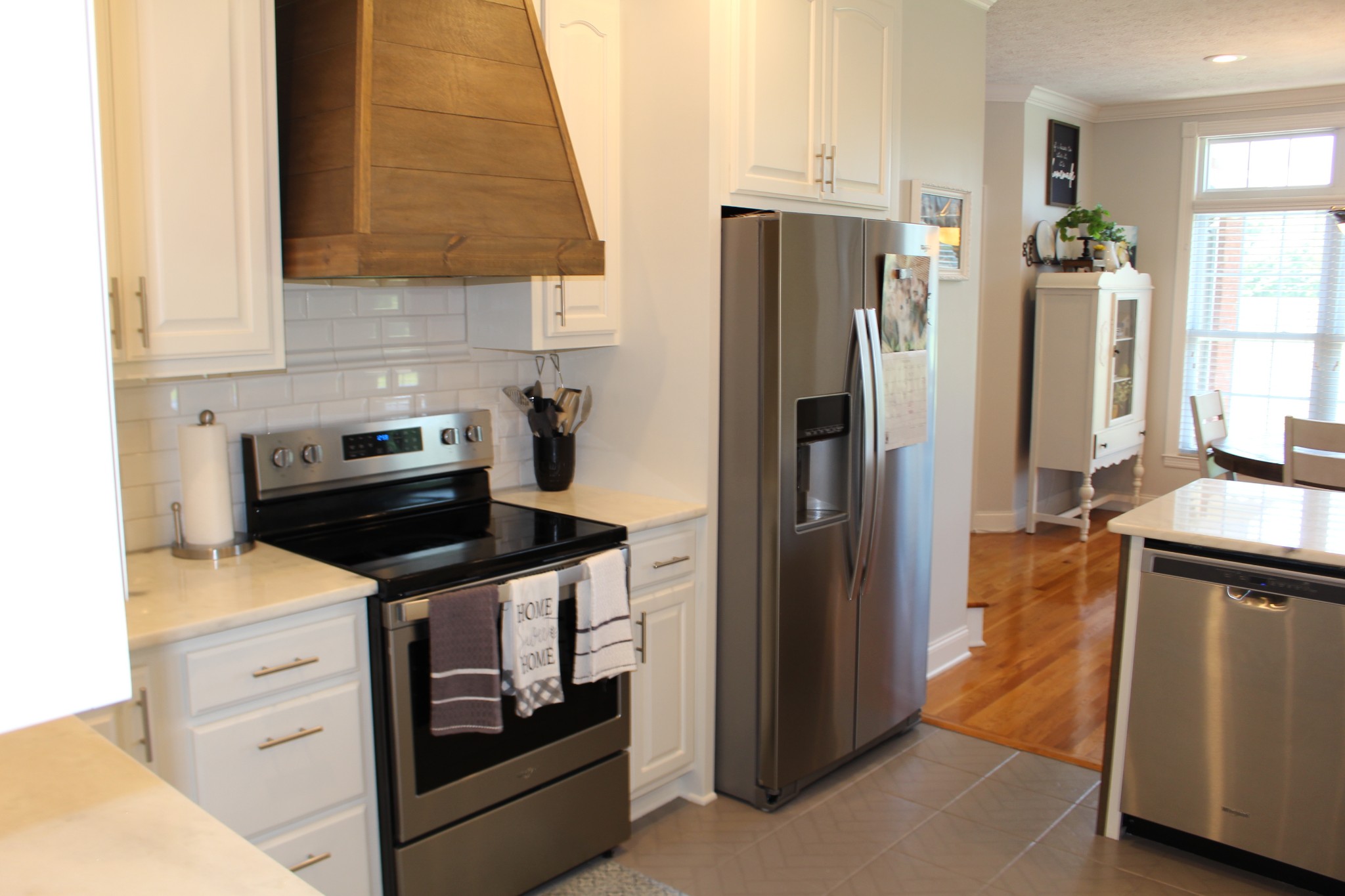 2707 Sixteenth Model Road Manchester, TN 37355 - Photo 13 of 50 a kitchen with a refrigerator sink and stove