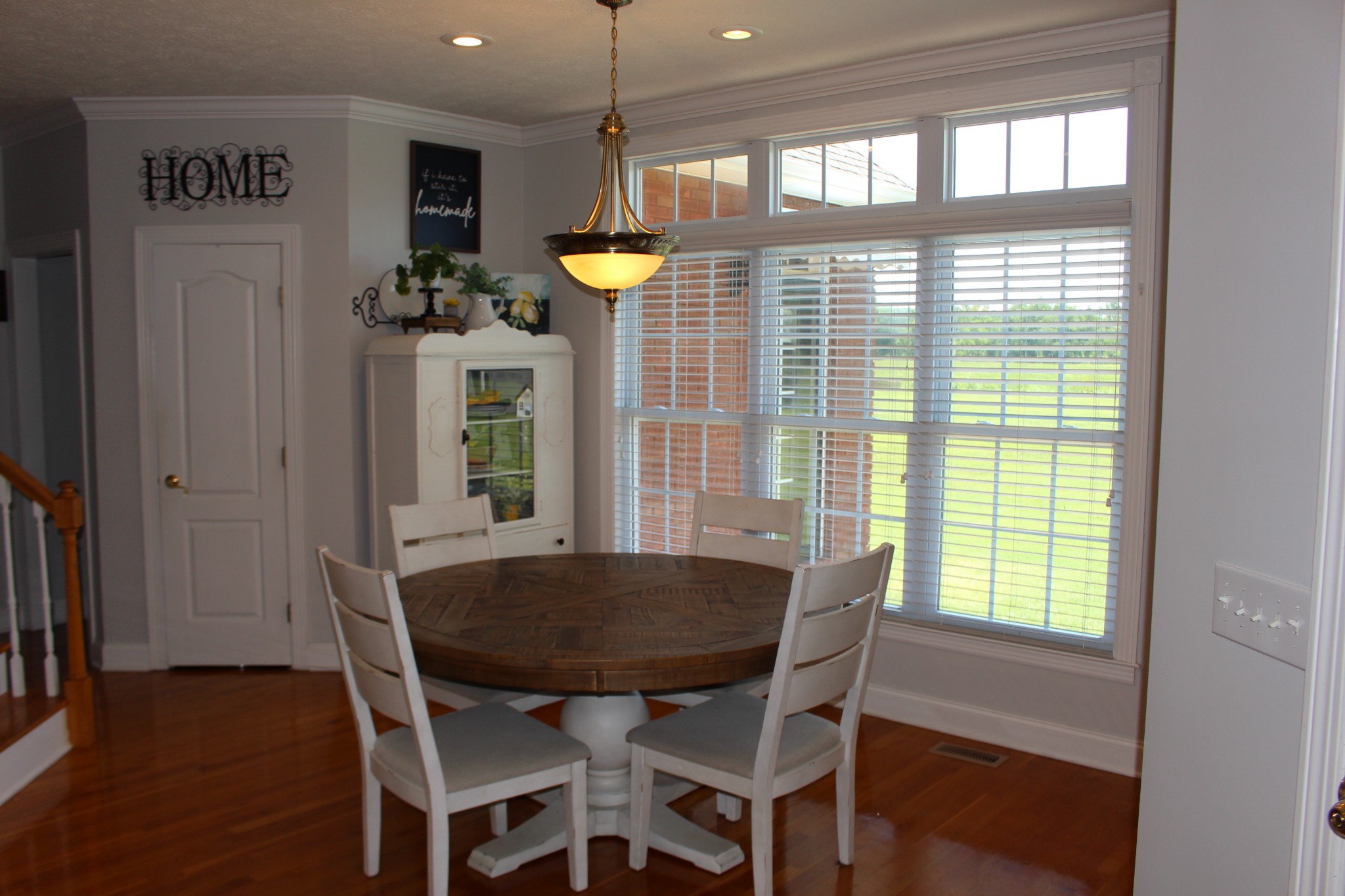 2707 Sixteenth Model Road Manchester, TN 37355 - Photo 19 of 50 a view of a dining room with furniture and a window
