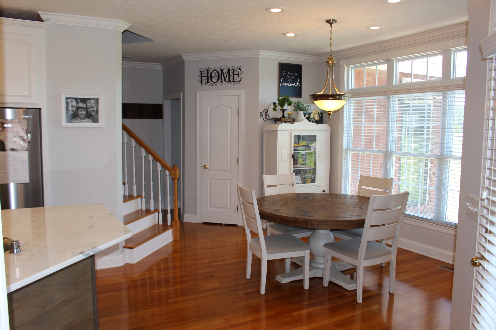 2707 Sixteenth Model Road Manchester, TN 37355 - Photo 20 of 50 a dining room with furniture window wooden floor