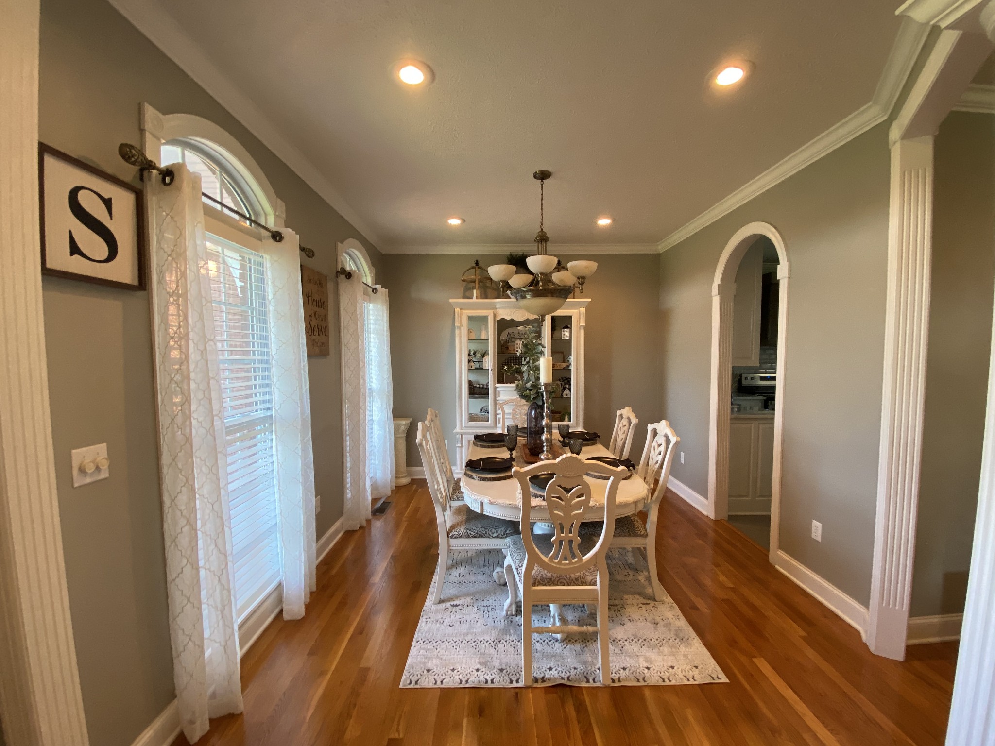 2707 Sixteenth Model Road Manchester, TN 37355 - Photo 22 of 50 a dining room with furniture and a glass door shower