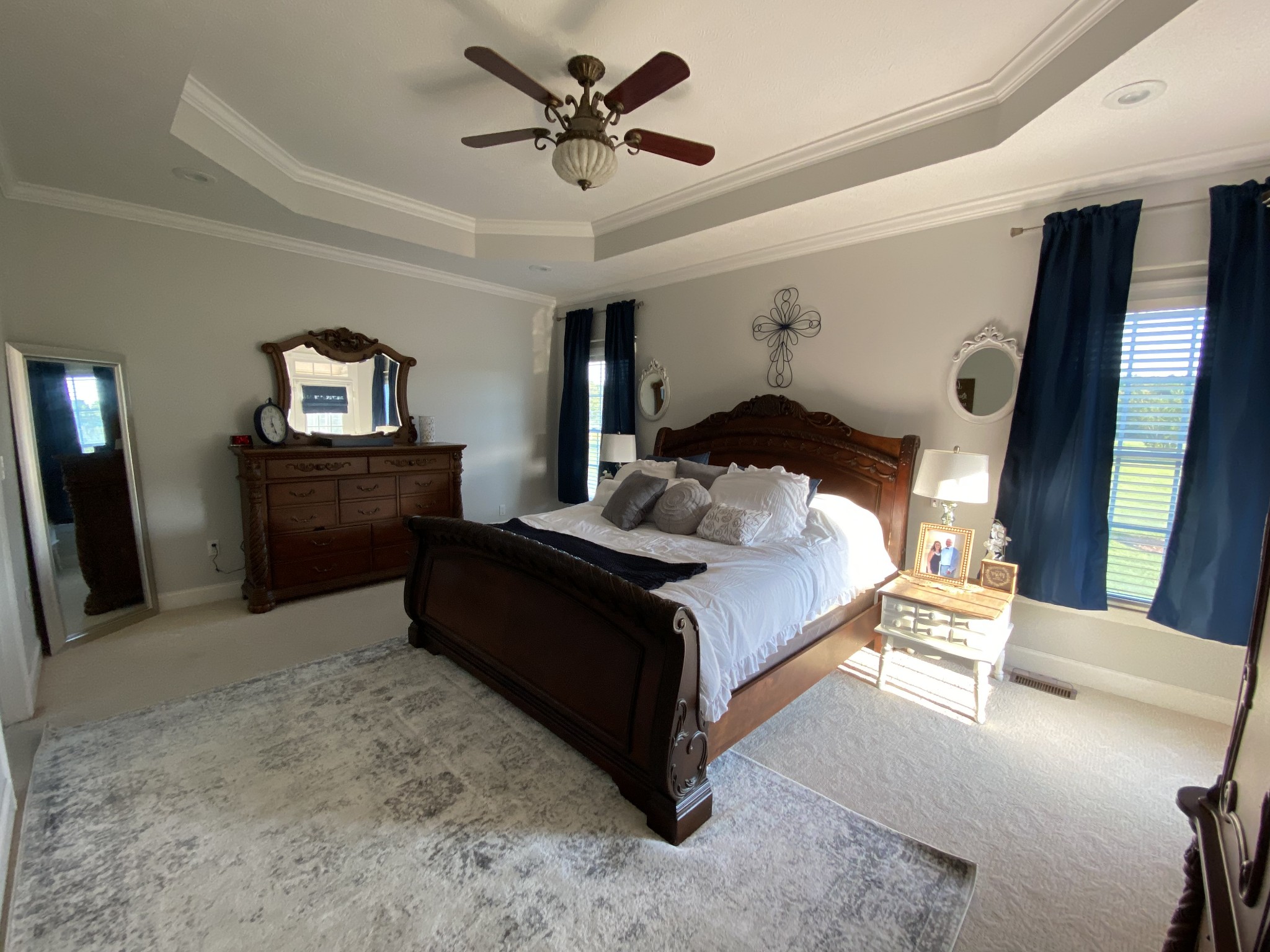 2707 Sixteenth Model Road Manchester, TN 37355 - Photo 25 of 50 a bedroom with a bed and a chandelier