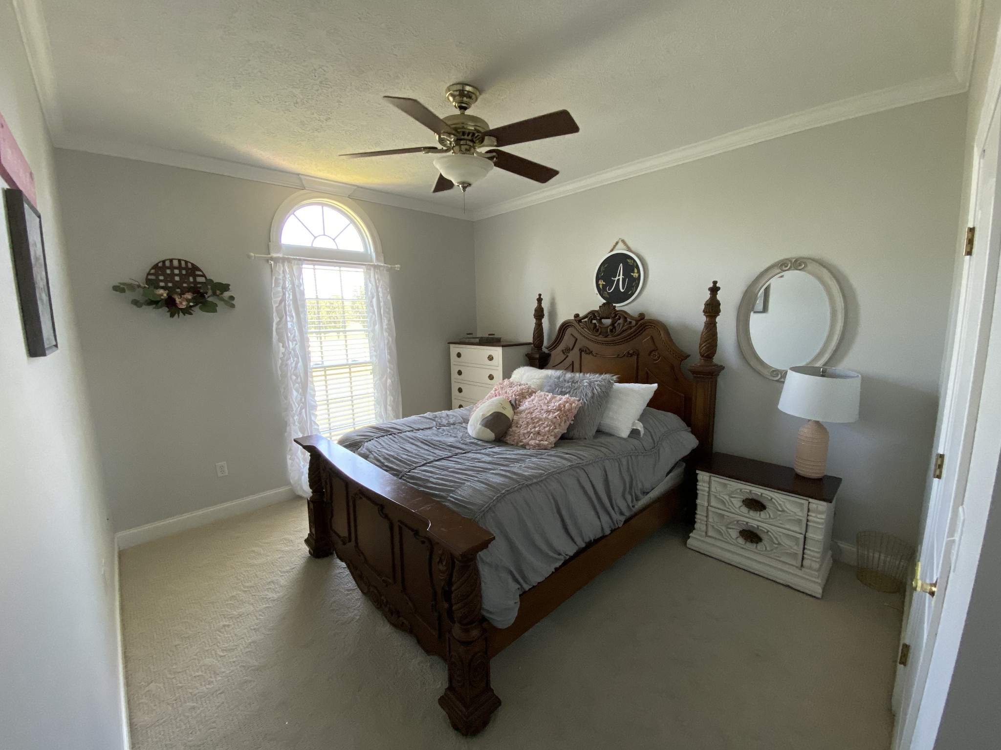 2707 Sixteenth Model Road Manchester, TN 37355 - Photo 28 of 50 a bedroom with a bed and a chandelier