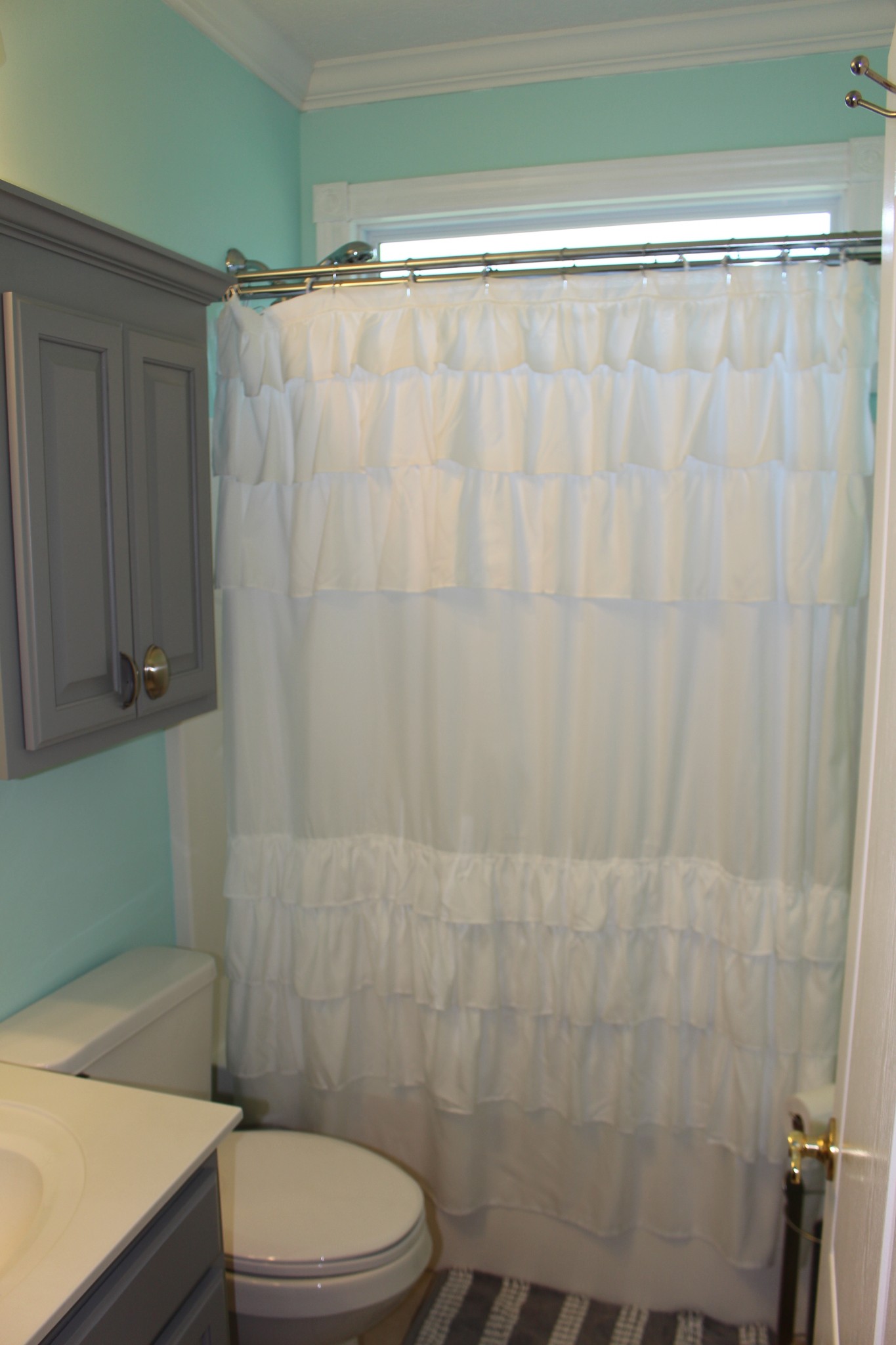 2707 Sixteenth Model Road Manchester, TN 37355 - Photo 31 of 50 a bathroom with a shower curtain and a toilet