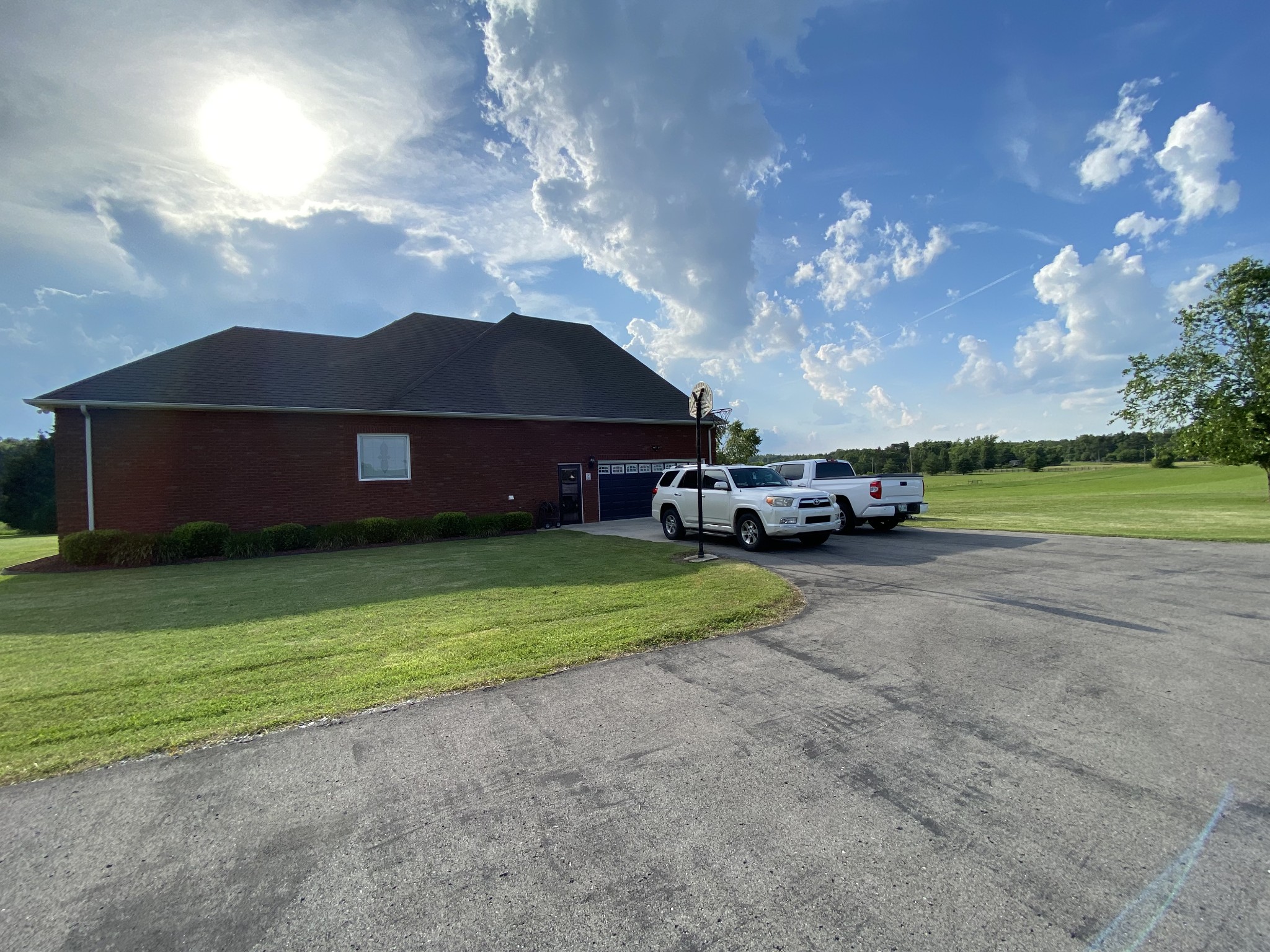 2707 Sixteenth Model Road Manchester, TN 37355 - Photo 45 of 50 a front view of a house with a yard and a garage