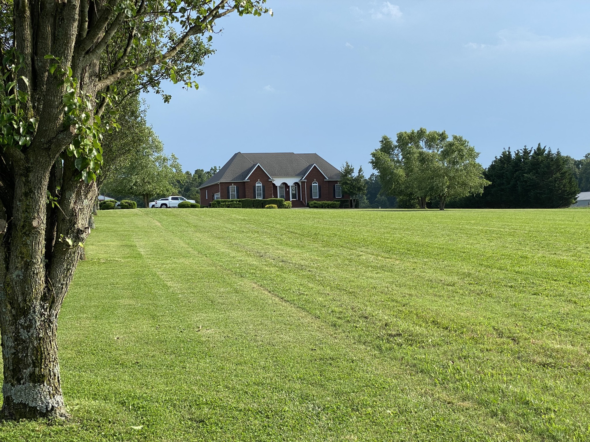 2707 Sixteenth Model Road Manchester, TN 37355 - Photo 46 of 50 a big yard with lots of green space and fog