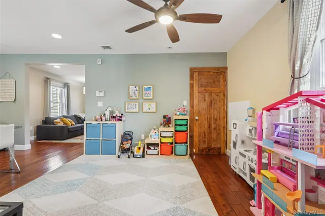 a bedroom with furniture and a chandelier