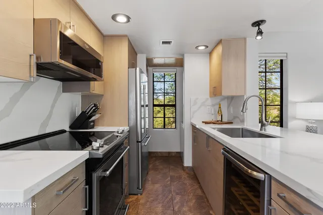 a kitchen with a stove and a microwave