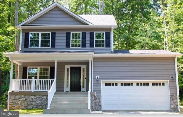 a front view of a house with a porch