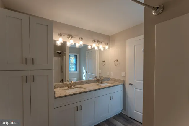 an aerial view of a house with outdoor space