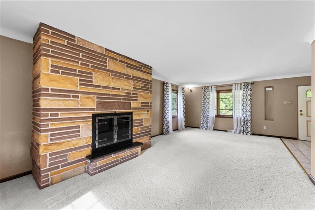 4948 Ashbaugh Road Murrysville, PA 15668 - Photo 10 of 48 Log Stone faced Fireplace in Living Room