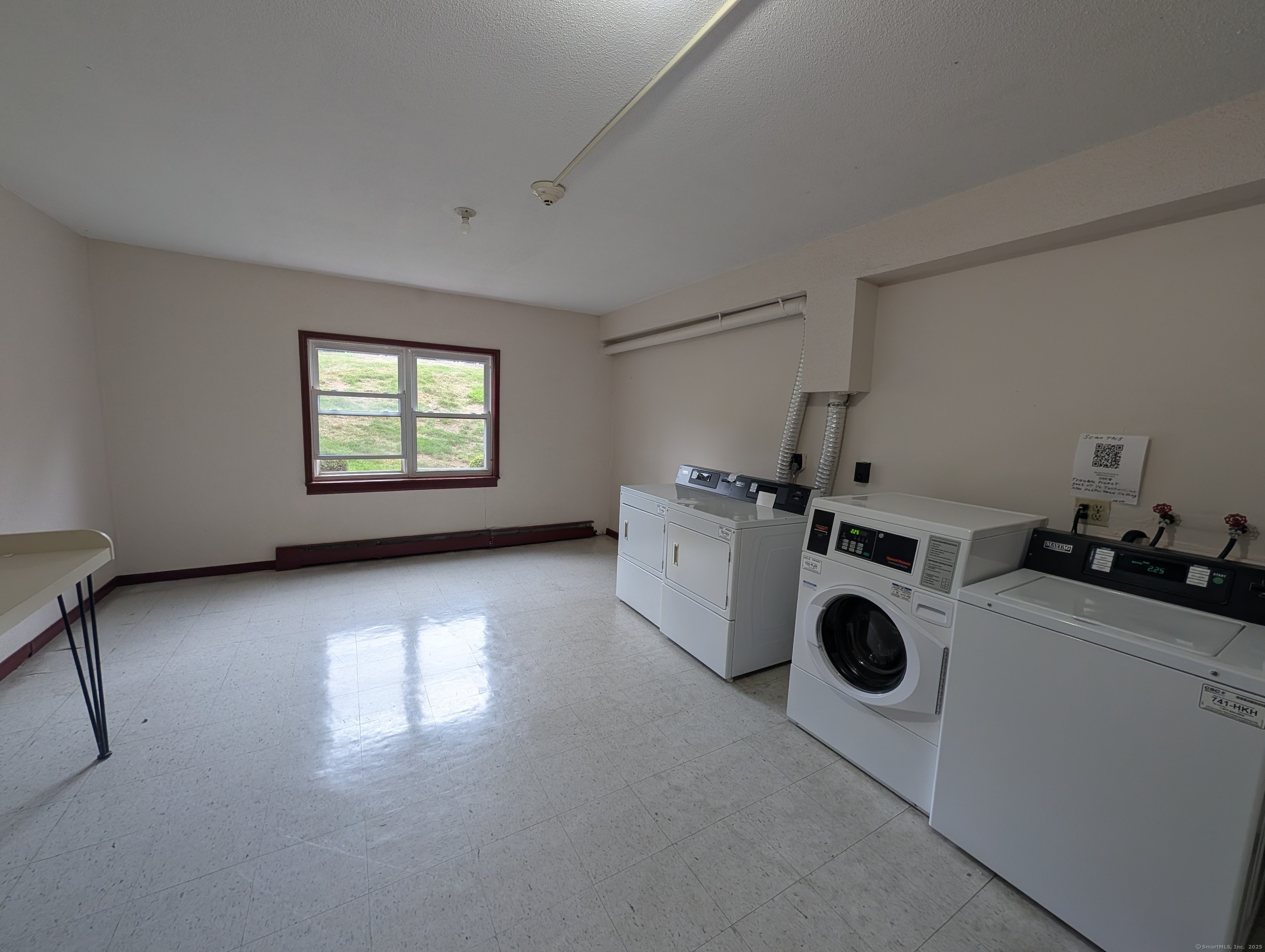 41 Balance Rock Road, Unit 16 Seymour, CT 06483 - Photo 13 of 13 a kitchen with a refrigerator a sink a stove and cabinets