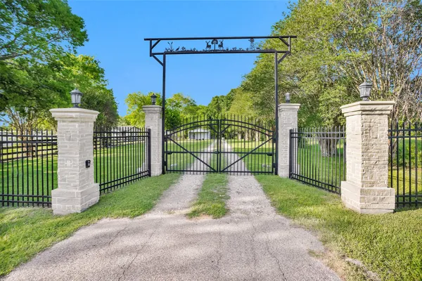 $1,390,000 | 13250 Farm To Market Road 830, Willis, TX 77318