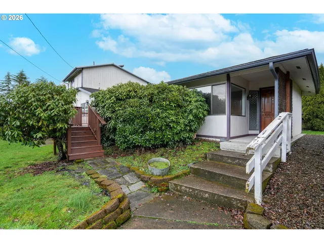 a house view with a garden space
