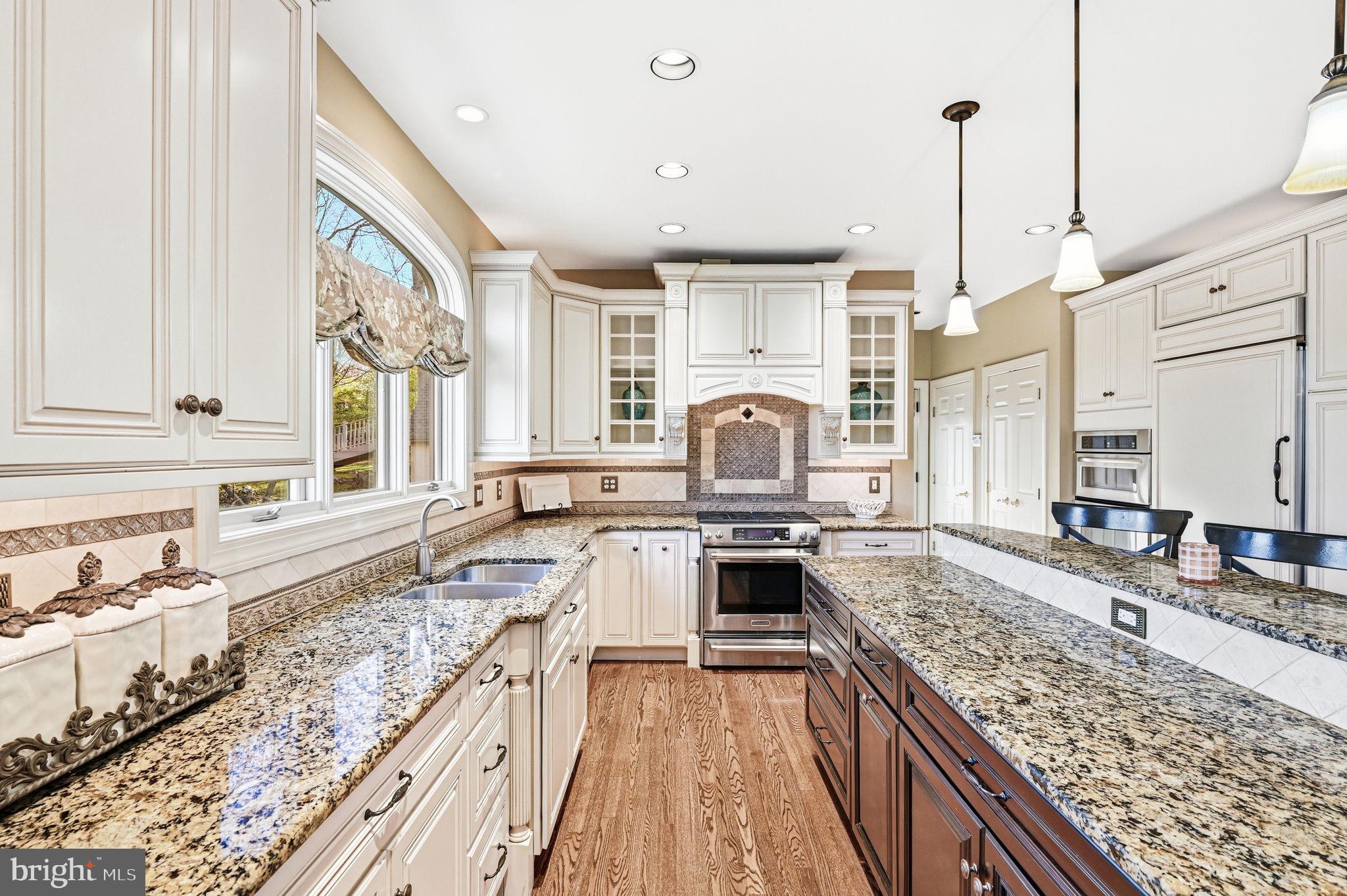 1714 Hickory Hill Road Chadds Ford, PA 19317 - Photo 27 of 82 a large kitchen with stainless steel appliances granite countertop a stove a sink and a granite counter tops