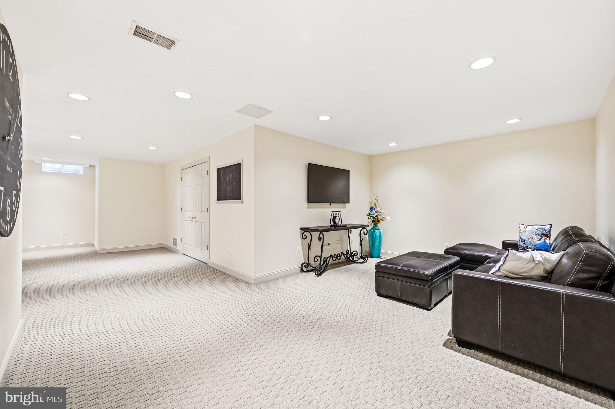 1714 Hickory Hill Road Chadds Ford, PA 19317 - Photo 48 of 82 a living room with furniture and a flat screen tv