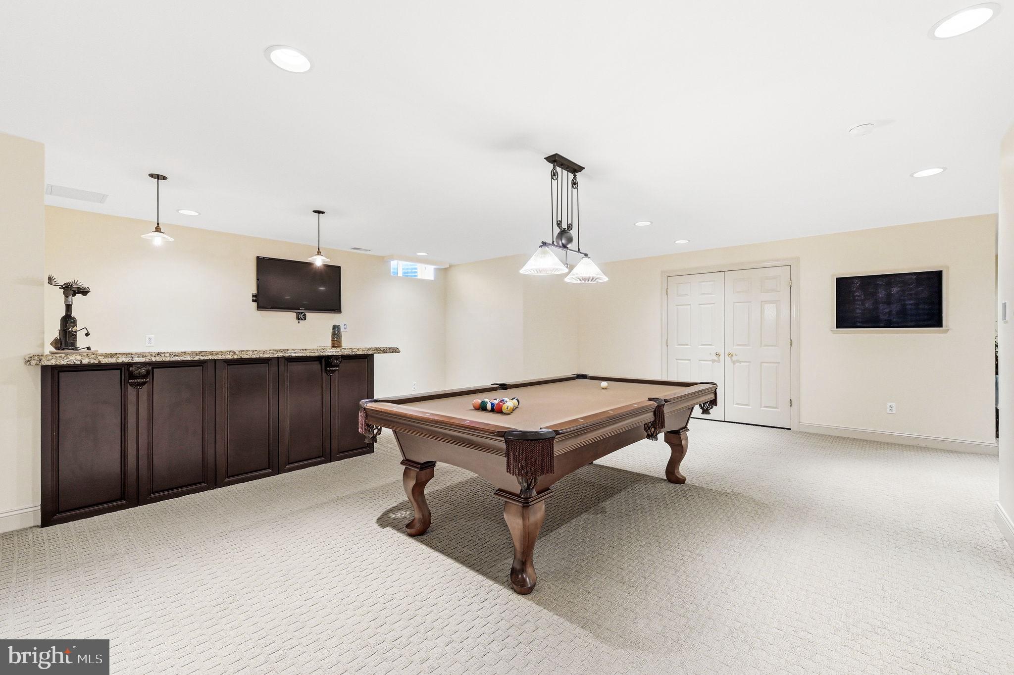 1714 Hickory Hill Road Chadds Ford, PA 19317 - Photo 51 of 82 a living room with furniture a flat screen tv and kitchen view