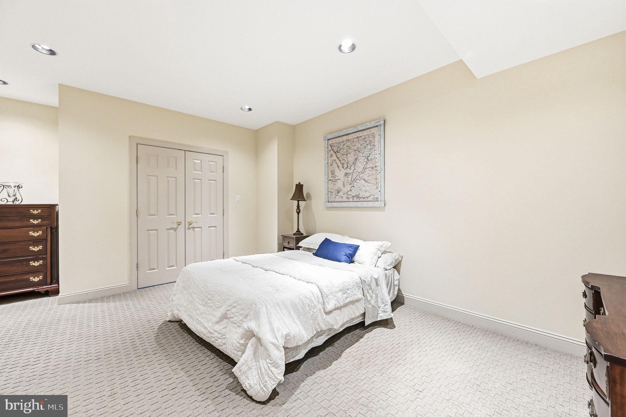 1714 Hickory Hill Road Chadds Ford, PA 19317 - Photo 56 of 82 a bedroom with a bed and a cabinets