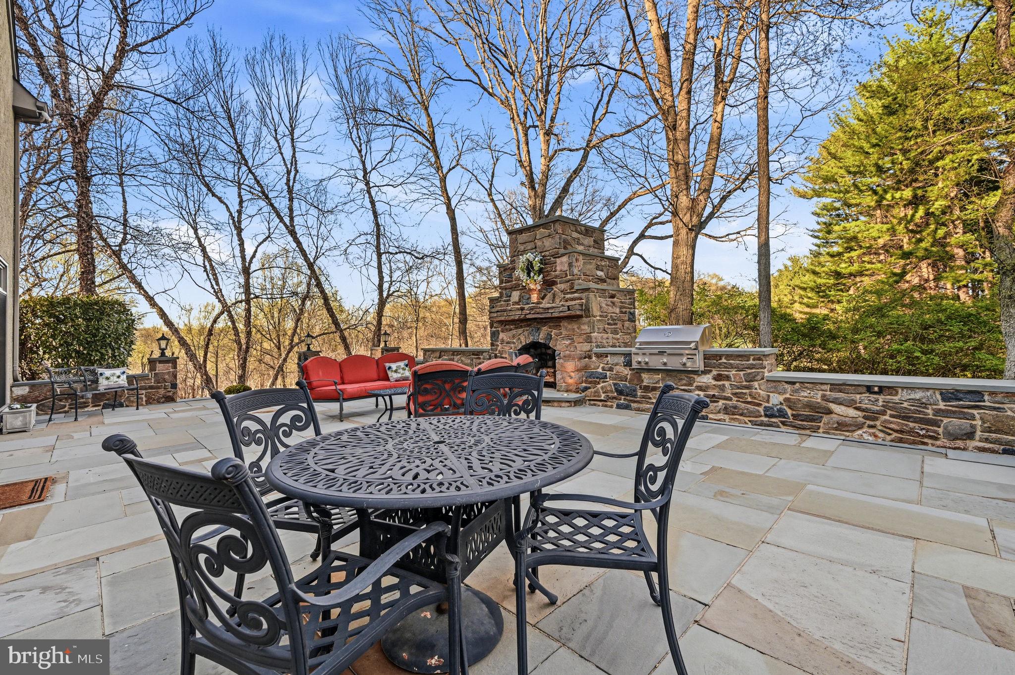 1714 Hickory Hill Road Chadds Ford, PA 19317 - Photo 63 of 82 a view of a dinning table and chairs in the patio