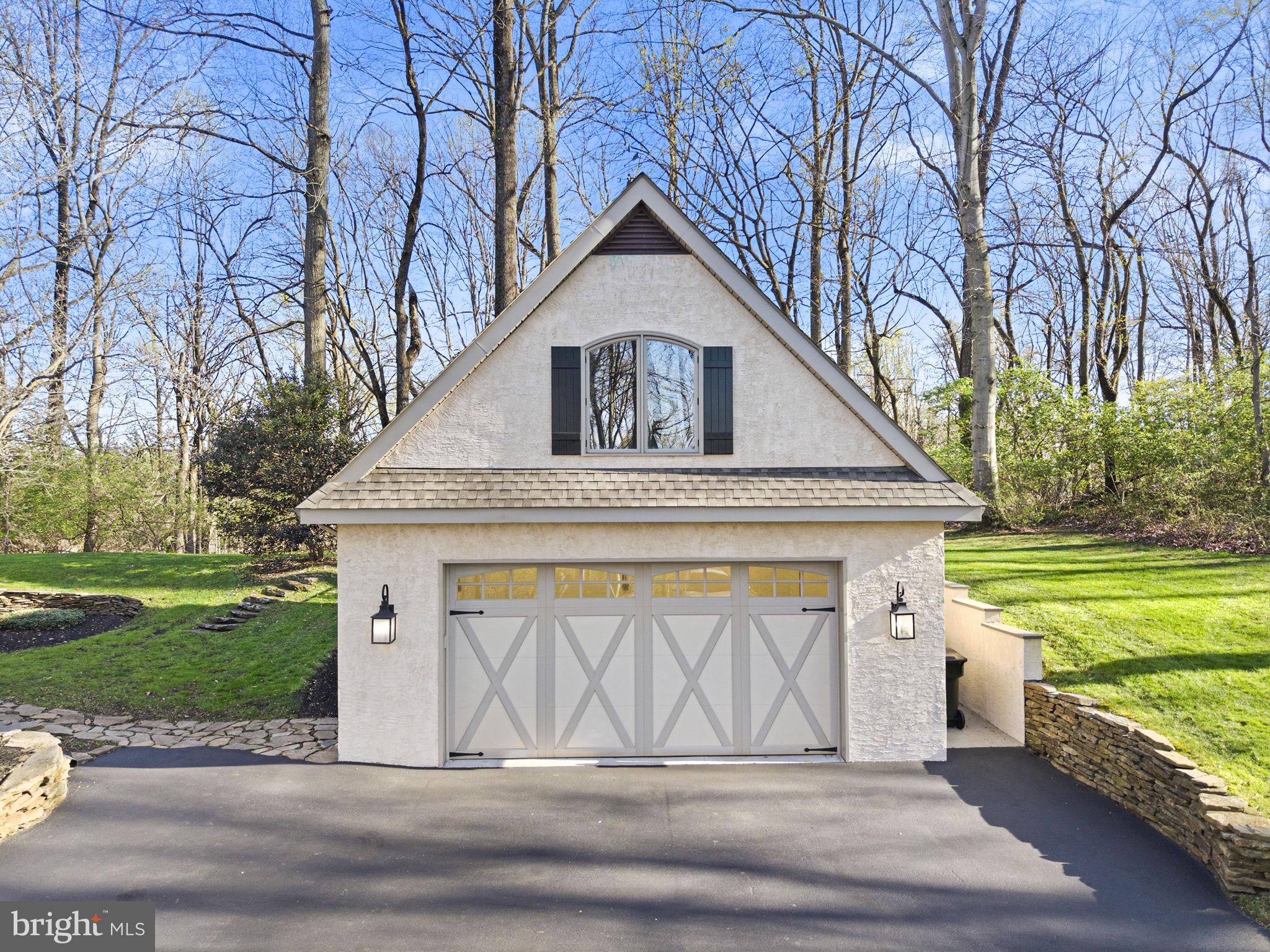 1714 Hickory Hill Road Chadds Ford, PA 19317 - Photo 67 of 82 a front view of a house with a yard and garage