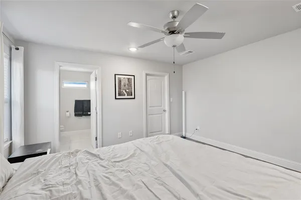 a view of a bedroom with a large bed