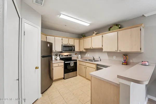 $245,000 | 1701 The Greens Way, Unit 212, Jacksonville Beach, FL 32250
