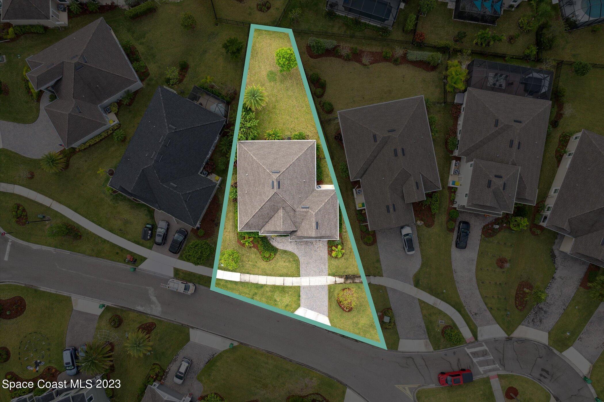 3611 Stabane Place Melbourne, FL 32940 - Photo 41 of 50 an aerial view of residential houses with outdoor space