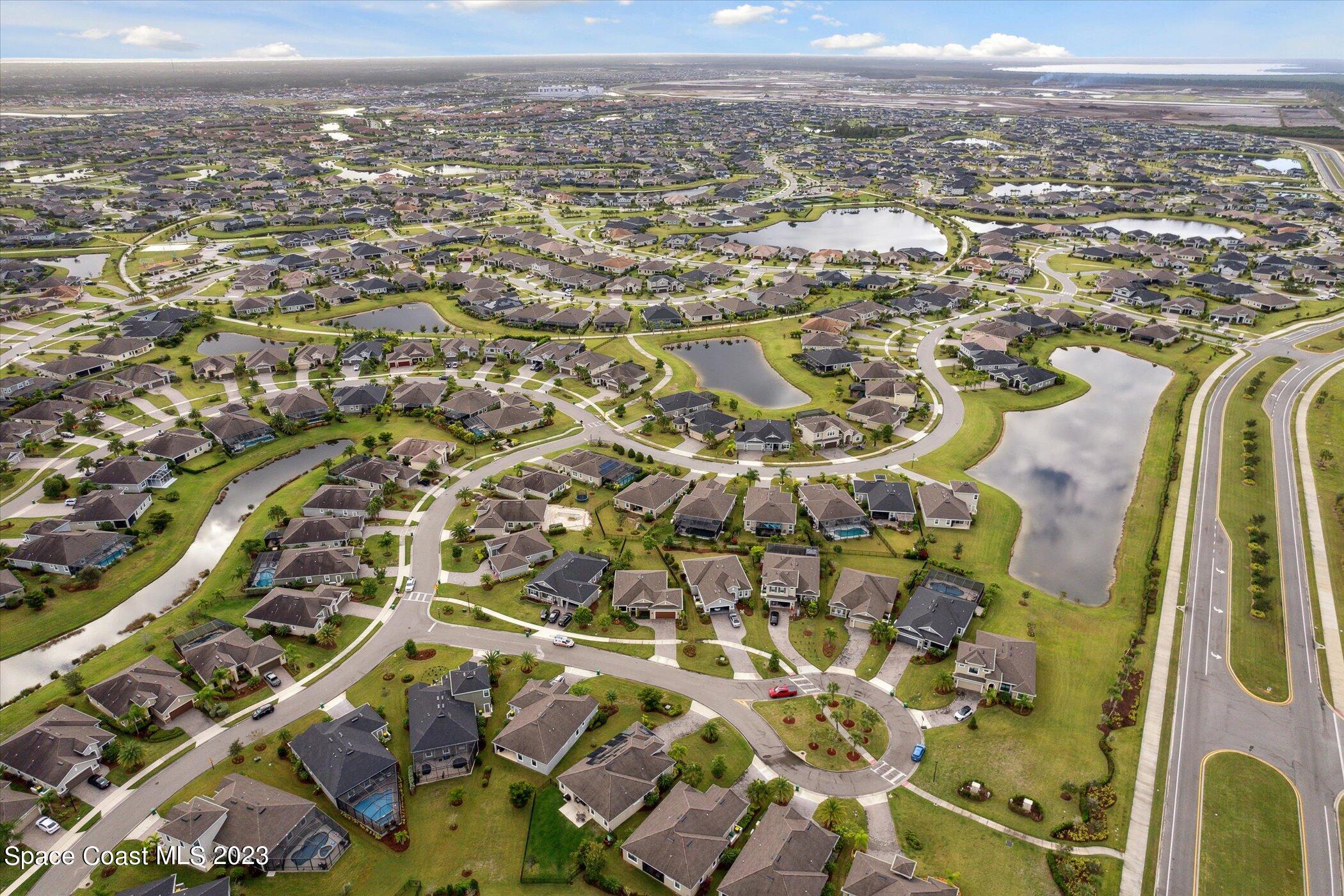 3611 Stabane Place Melbourne, FL 32940 - Photo 43 of 50 an aerial view of residential building with parking space