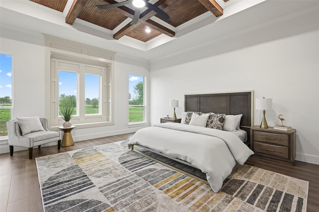 1000 Canyon Lake Road Wills Point, TX 75169 - Photo 12 of 40 Bedroom featuring crown molding, coffered ceiling, baseboards, beam ceiling, and wood finished floors